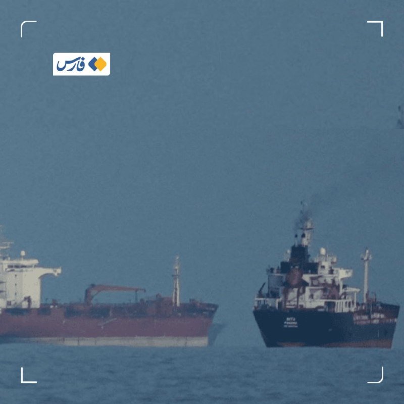 A dark-hulled ship is positioned closely alongside a rust-red tanker on open blue water, with a news channel logo visible in the upper corner.