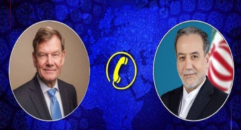A graphic shows two circular portraits of men in suits flanking a yellow telephone icon against a blue patterned background, with a flag visible behind the right figure.