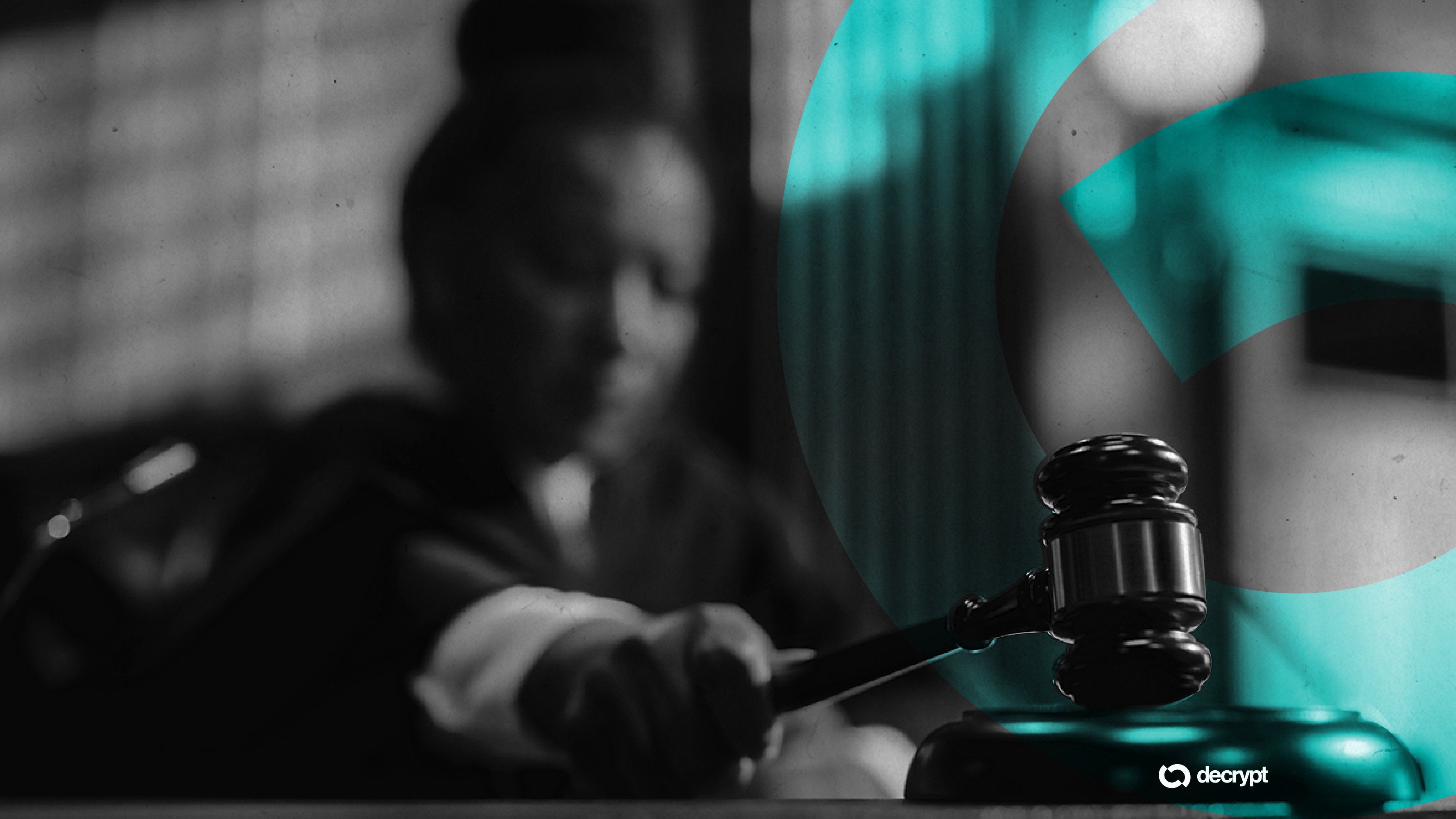 A black-and-white image shows a judge striking a gavel in the foreground, with blurred figures and a teal "decrypt" logo in the background.