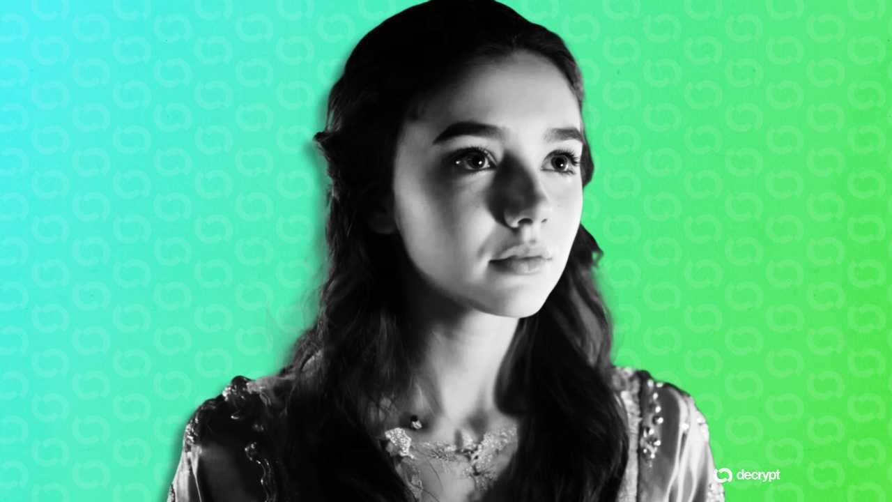 A young woman with long dark hair is shown in black and white against a green and teal patterned background with a "decrypt" logo in the corner.