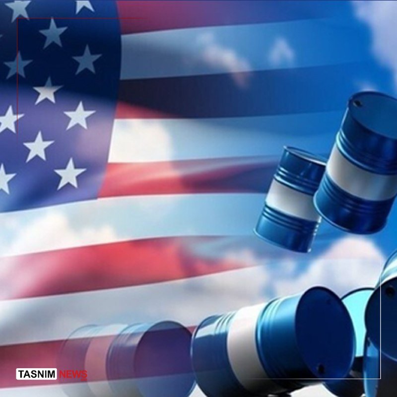 A digital illustration shows metallic blue oil barrels in the foreground against a waving American flag, with the "TASNIM NEWS" logo in the bottom left corner.