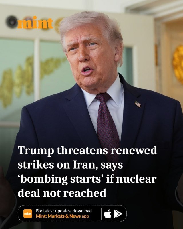 A man with light hair in a dark suit and burgundy tie speaks indoors, with a Mint news graphic reading "Trump threatens renewed strikes on Iran" overlaid.