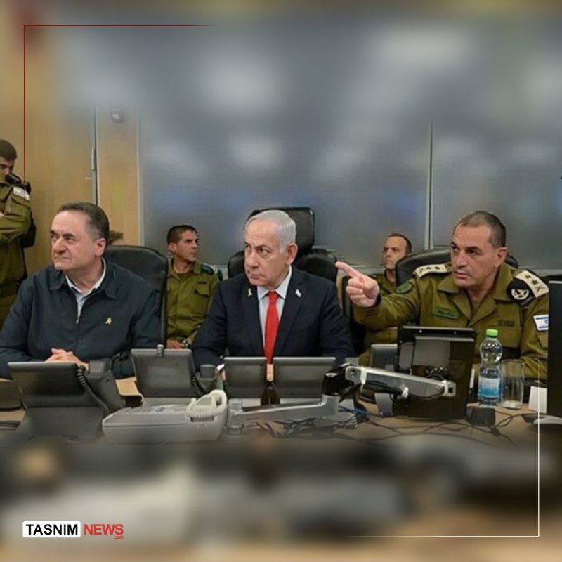 Men in suits and military uniforms sit at a conference table with monitors, while one uniformed officer gestures toward a screen, bearing a "Tasnim News" watermark.