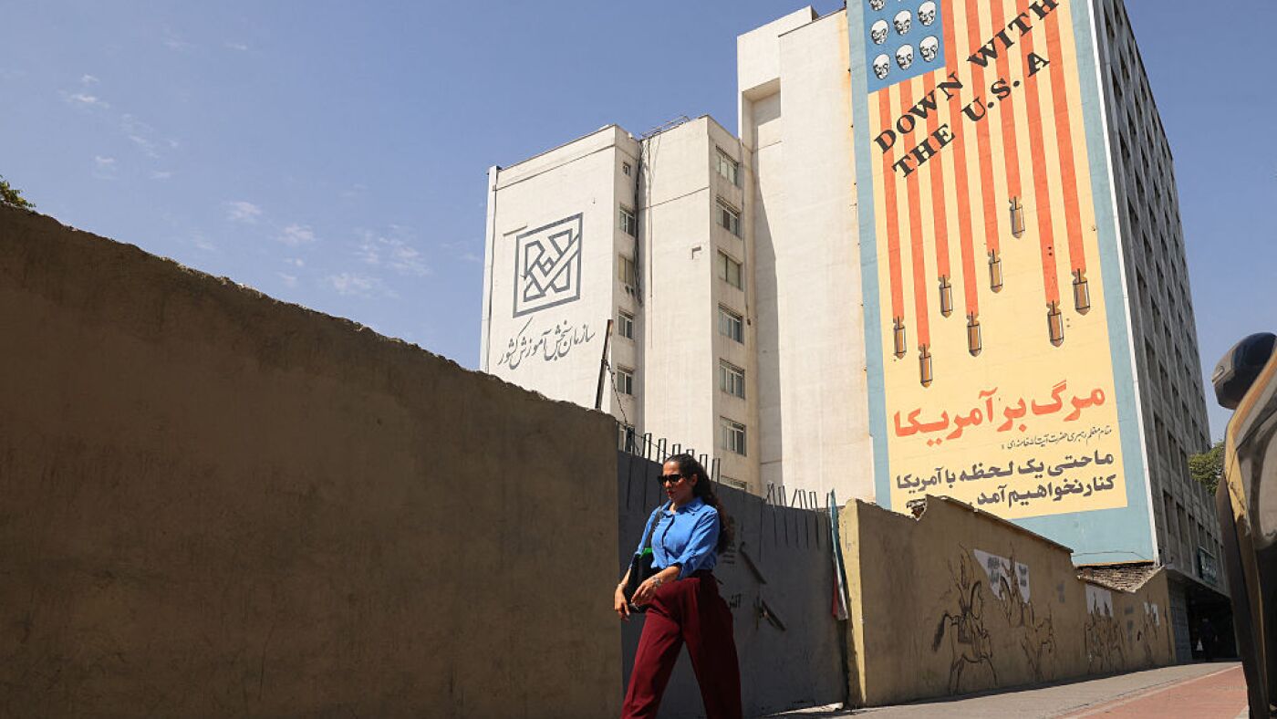 President Trump's decision to suspend a US operation protecting commercial vessels through the Strait of Hormuz is either a calculated diplomatic opening toward Tehran — or the most consequential signal yet that the administration's maximum…