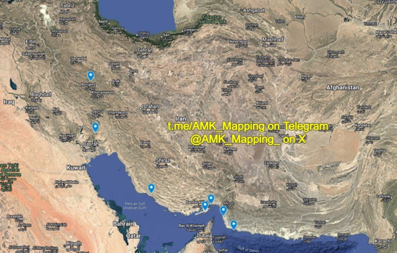 A satellite map of Iran and surrounding regions displays several blue location pins clustered across western and southern areas, overlaid with yellow text reading "t.me/AMK_Mapping on Telegram @AMK_Mapping_on X."