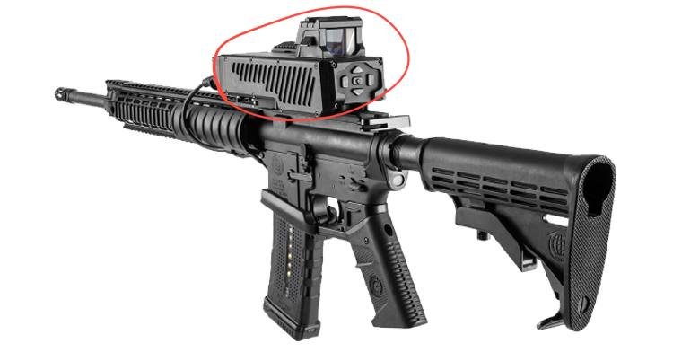 A black rifle is displayed against a white background, featuring a red dot sight highlighted by a red circle on its top rail.