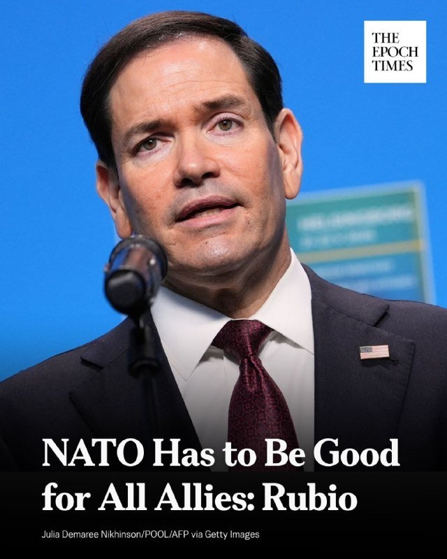 A man in a dark suit and burgundy tie speaks at a microphone against a blue backdrop, with "The Epoch Times" logo and headline "NATO Has to Be Good for All Allies: Rubio."