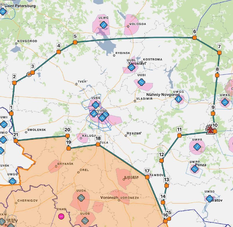 A map displays a region around Moscow with numbered orange markers, labeled Russian cities, hexagonal symbols, and shaded zones marking territorial boundaries.