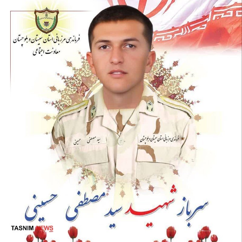 A young soldier in a desert camouflage uniform appears in a portrait graphic with Persian text, a military emblem, and the "TASNIM NEWS" logo at the bottom.