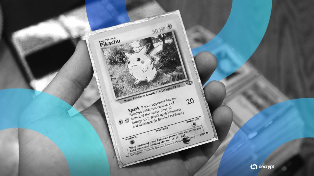 A hand holds a Pokémon trading card featuring Pikachu, displayed against a blurred background with blue and teal graphic overlays and a "decrypt" logo in the corner.