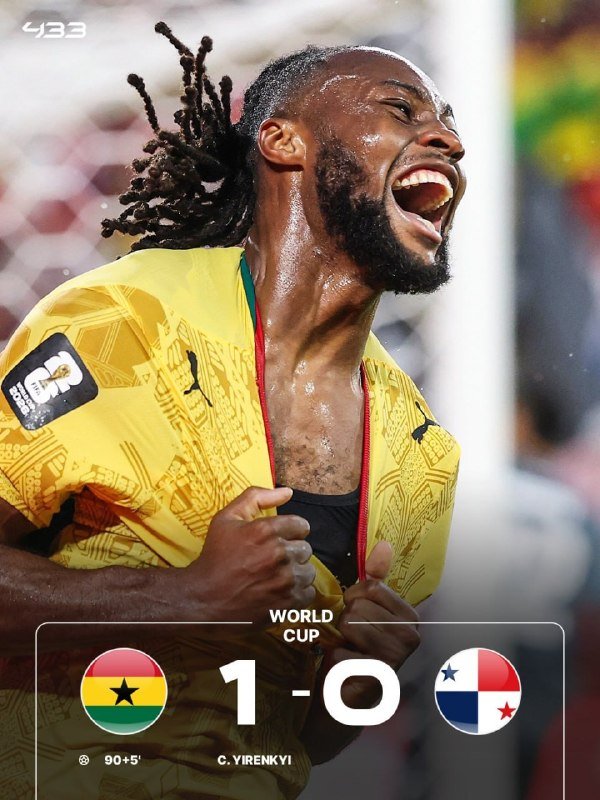 A bearded soccer player in a yellow Ghana jersey celebrates passionately with clenched fists, shown alongside a graphic displaying a 1-0 World Cup victory over Panama with a goal credited to C. Yirenkyi at 90+5 minutes.