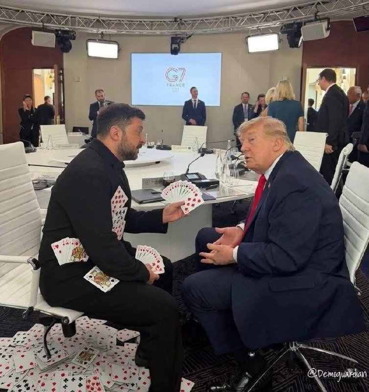 A digitally edited illustration shows two men seated at a conference table with a "G7 FINANCE 2025" screen behind them, one holding playing cards amid scattered cards on the floor.