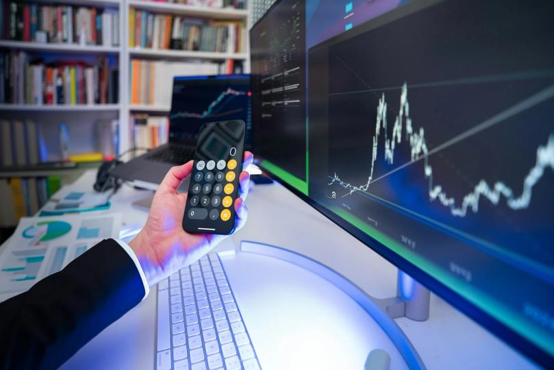Kevin Warsh's debut as Fed chair produced no rate move — but the dots, the dissent, and the press conference together told markets a cut was further off than the soft-money consensus had wagered.