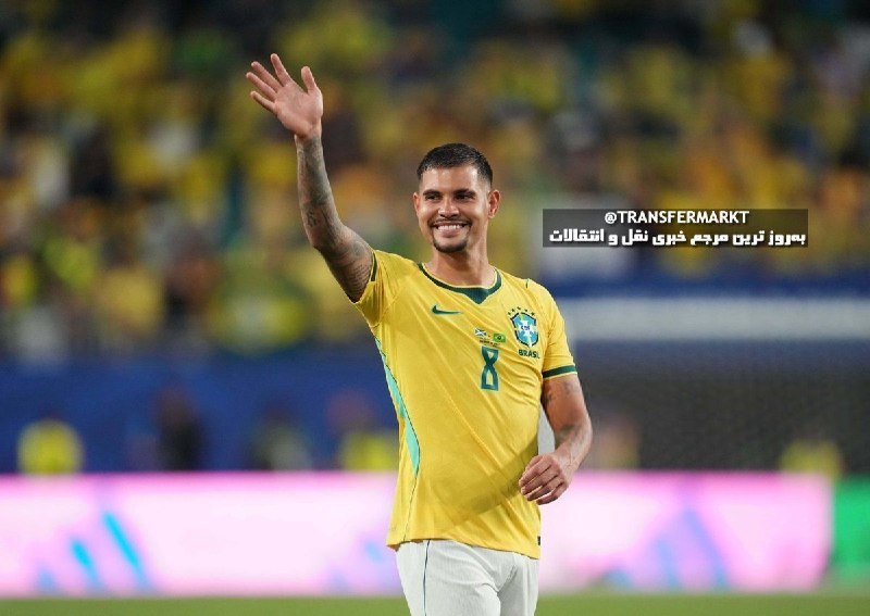 A smiling soccer player in a yellow Brazil jersey waves to a stadium crowd.