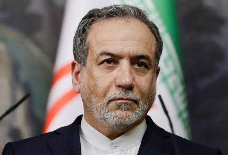 A deputy communications chief in Tehran publishes the negotiating team's opening line — ending the campaign against Lebanon — before cameras, suggesting a deliberate public framing of the channel as primarily regional, not nuclear.