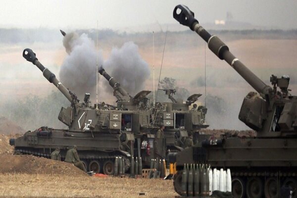 Self-propelled howitzers fire rounds in a smoky, open field, with a soldier crouched beside one marked "92."
