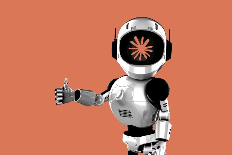 A white humanoid robot with an orange loading symbol on its visor gives a thumbs-up against a solid coral-orange background.