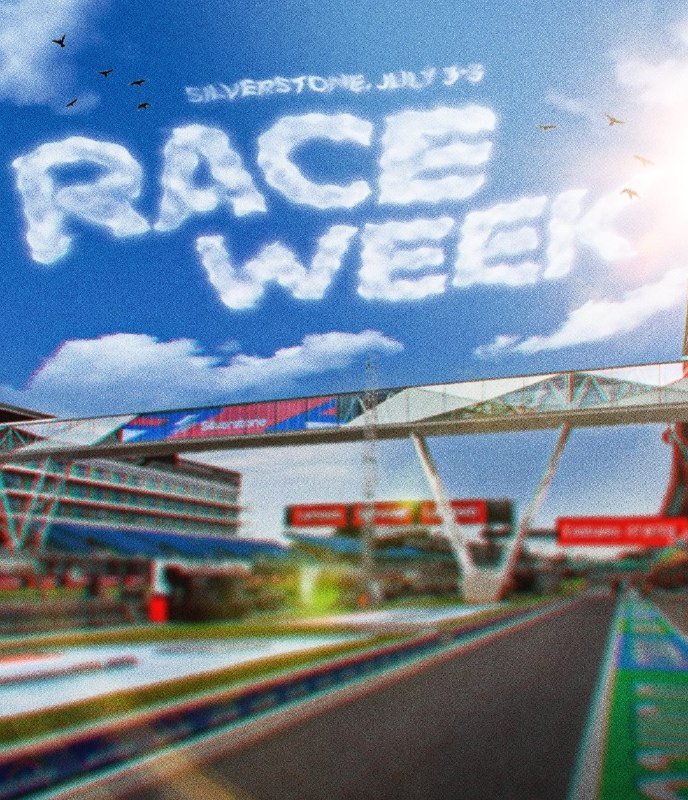A skywriting message reading "SILVERSTONE, JULY 3-5 RACE WEEK" appears above a race track featuring a pedestrian bridge, grandstands, and signage.