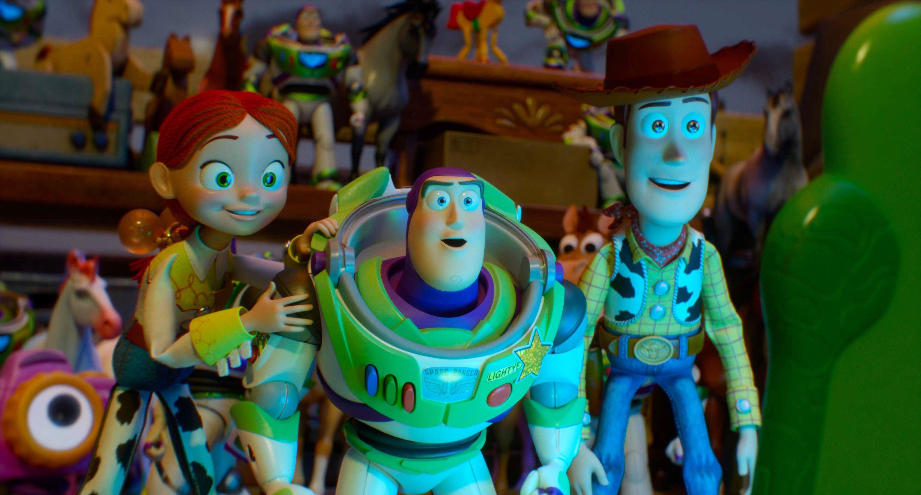 A red-haired cowgirl doll, a space ranger doll, and a cowboy doll stand together among various other toys on shelves in a cluttered toy-filled room.