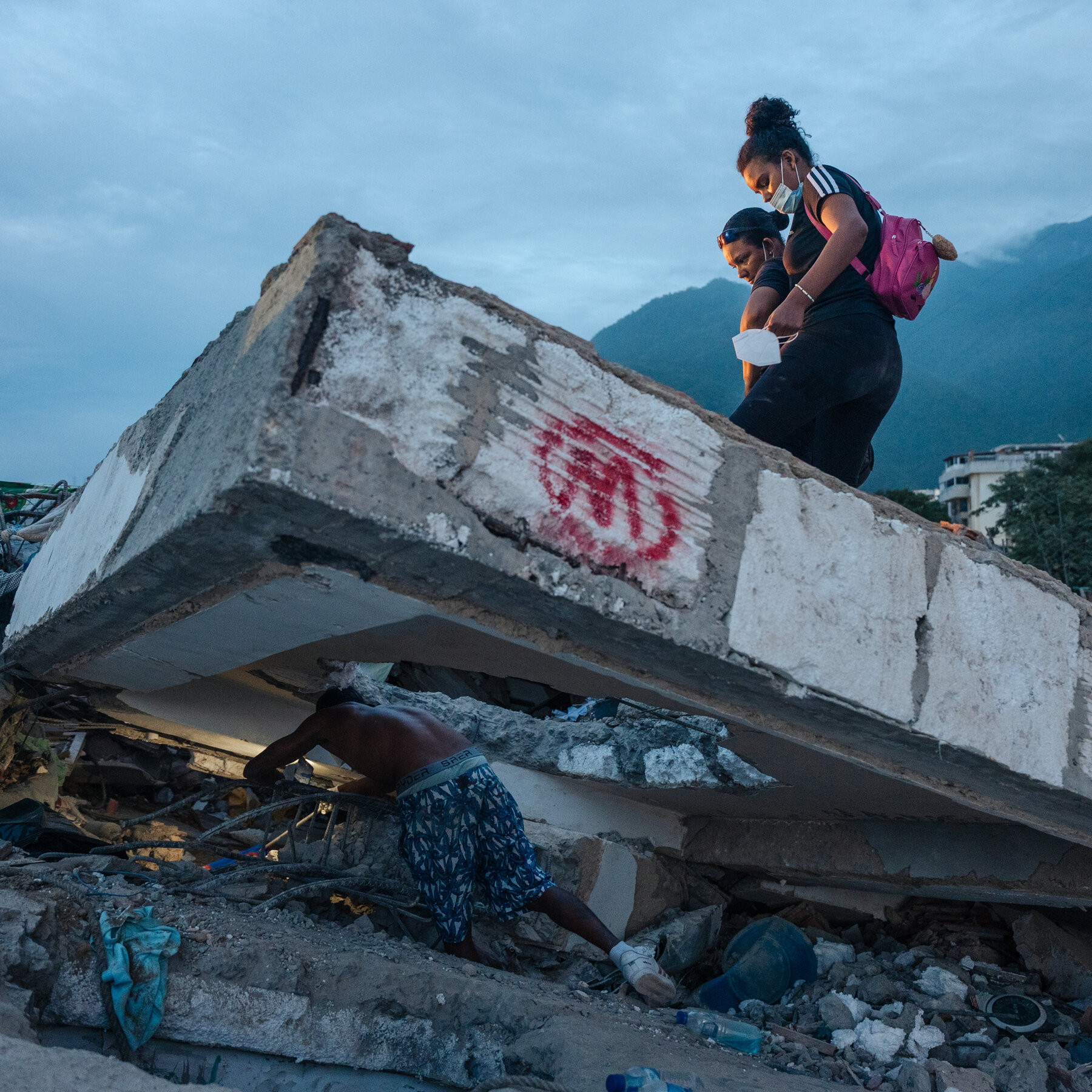 Two earthquakes and a nine-figure aid package in the same week have reframed Washington's Venezuela posture.