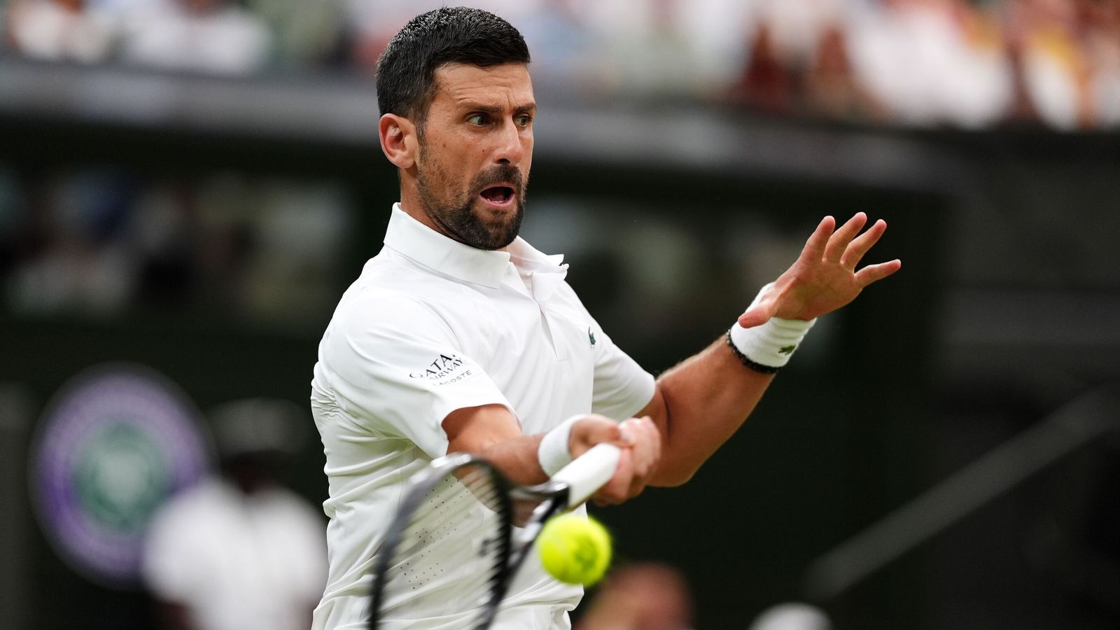 Defending champion Jannik Sinner bled through his shoe and dropped two sets before scraping past Miomir Kecmanovic on Centre Court — a result that tells less about his ceiling than about the new volatility at the top of the men's game.