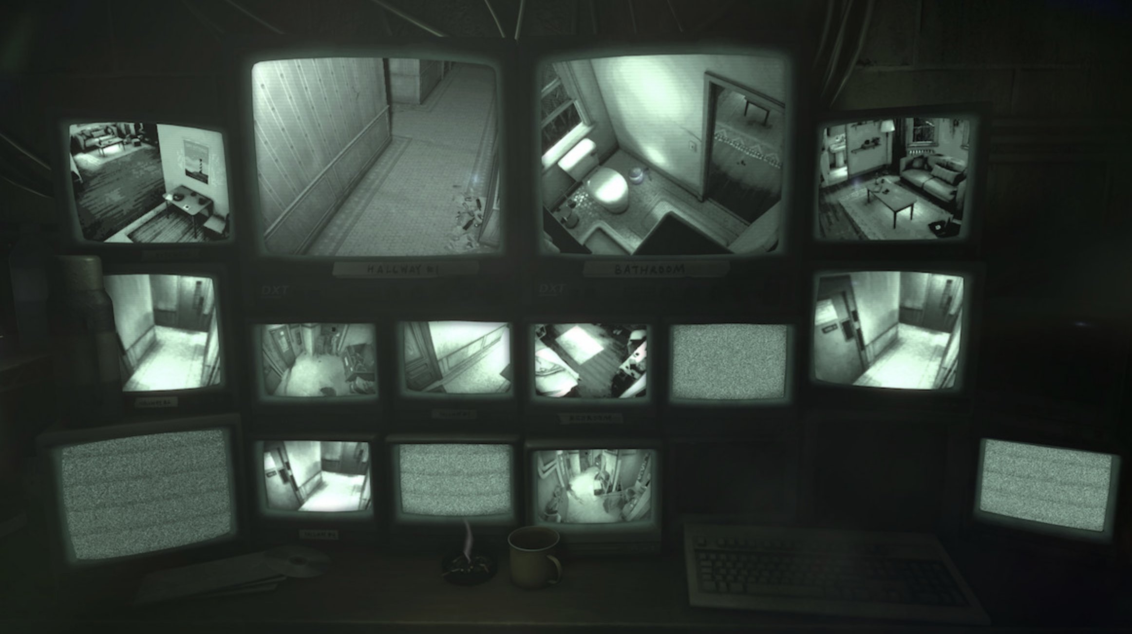 Multiple security monitors display black-and-white feeds of empty rooms and hallways, with some screens showing static, above a desk holding a keyboard, mug, and ashtray.