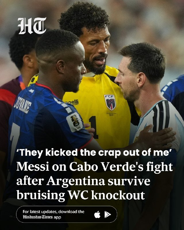 Three soccer players in blue, yellow, and light blue jerseys confront each other face-to-face on a pitch, with overlaid headline text below.
