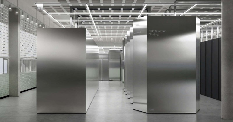 Row of tall metallic server cabinets labeled "IBM Quantum Starling" line a brightly lit data center corridor with exposed ceiling grids.