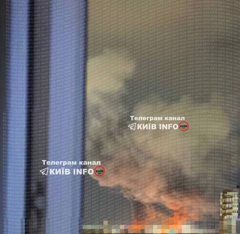 A graphic illustration shows a building engulfed in flames and thick smoke, overlaid with repeating "Київ INFO" watermark text and a Telegram channel logo.