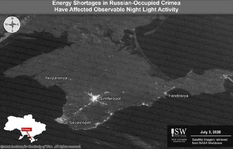 A grayscale satellite night-light map titled "Energy Shortages in Russian-Occupied Crimea" displays dimly lit urban areas labeled Yevpatoriya, Simferopol, Sevastopol, and Feodosiya.