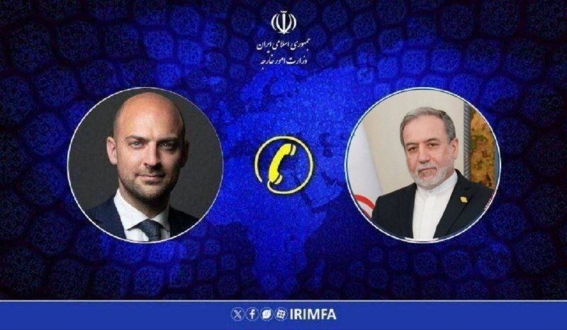 Graphic shows two men's portraits flanking a phone icon, with the Iranian foreign ministry emblem and Persian text above, against a blue patterned background.
