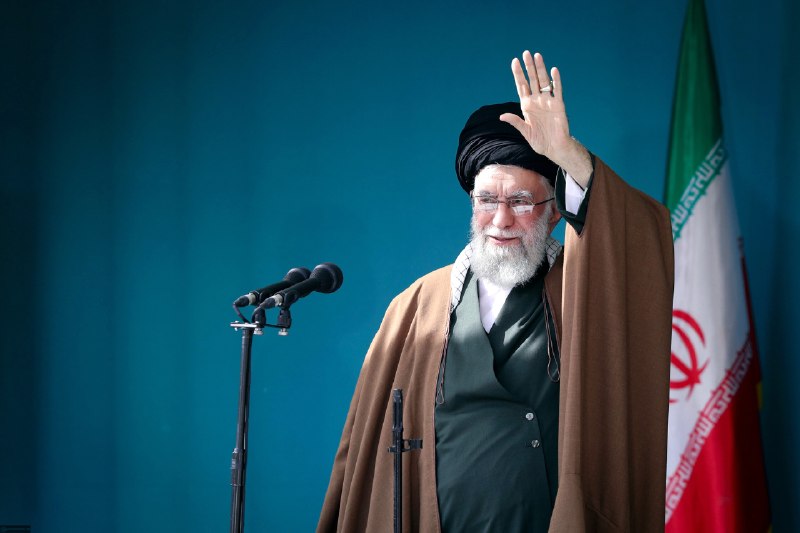 Mourners gather around the Jamkaran Mosque in Qom during the funeral prayer on 7 July 2026, as broadcast by the official Khamenei Telegram channel.