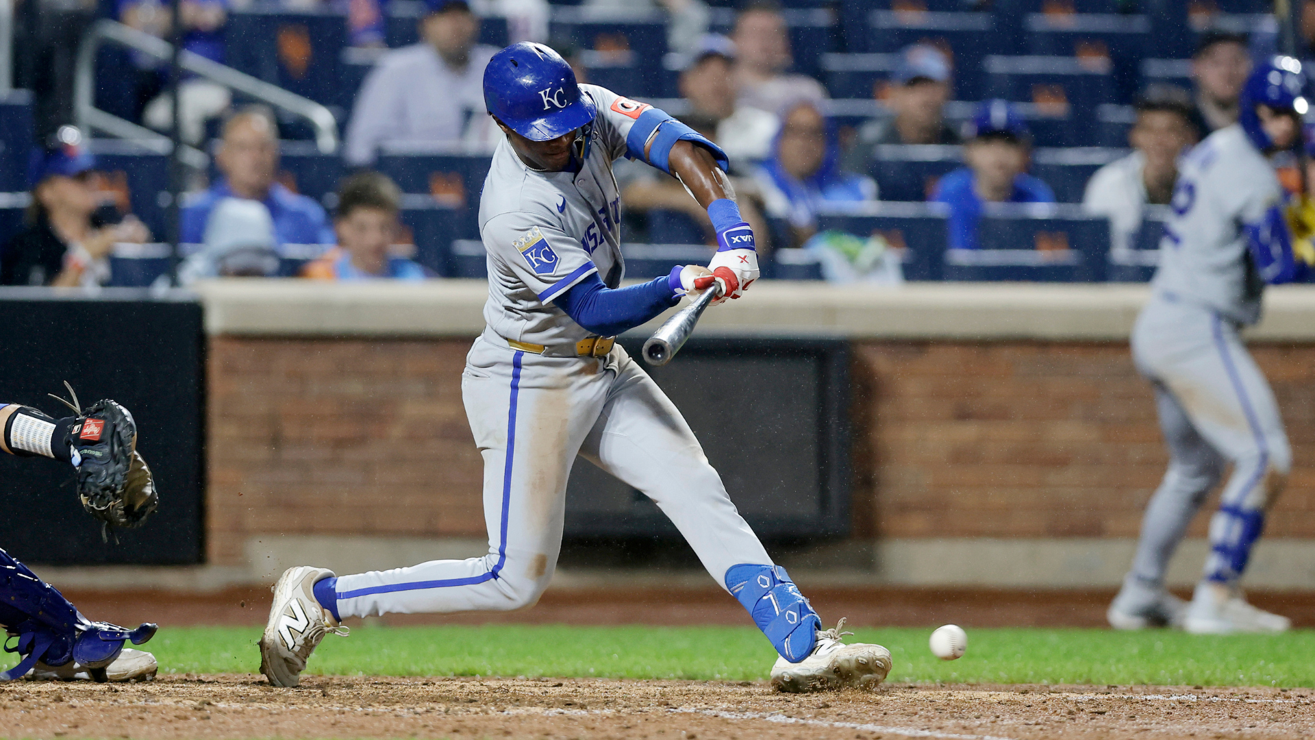 Tyler Tolbert of the Kansas City Royals crosses first base after an infield single that tied a major-league record for consecutive plate appearances with a hit.