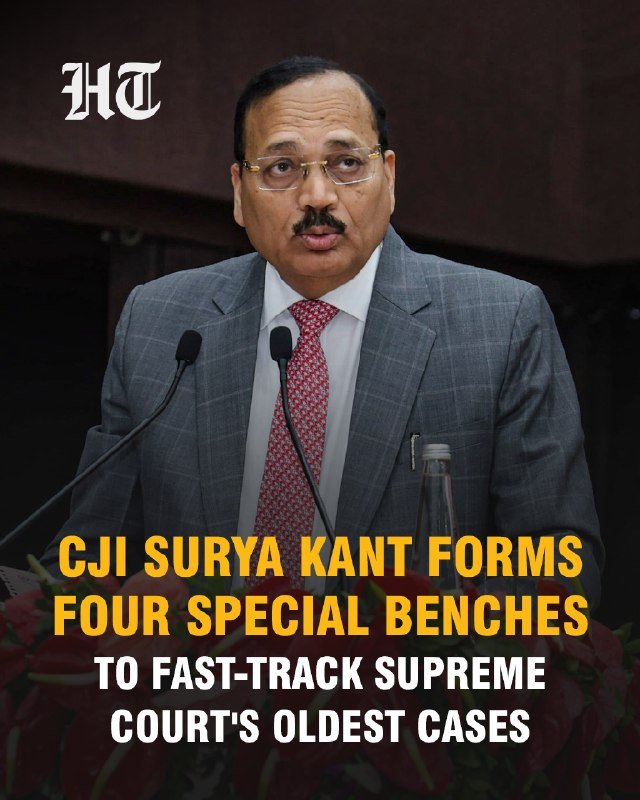 A man in a grey suit and red tie speaks at a podium with microphones, with text overlay reading "CJI Surya Kant forms four special benches to fast-track Supreme Court's oldest cases."