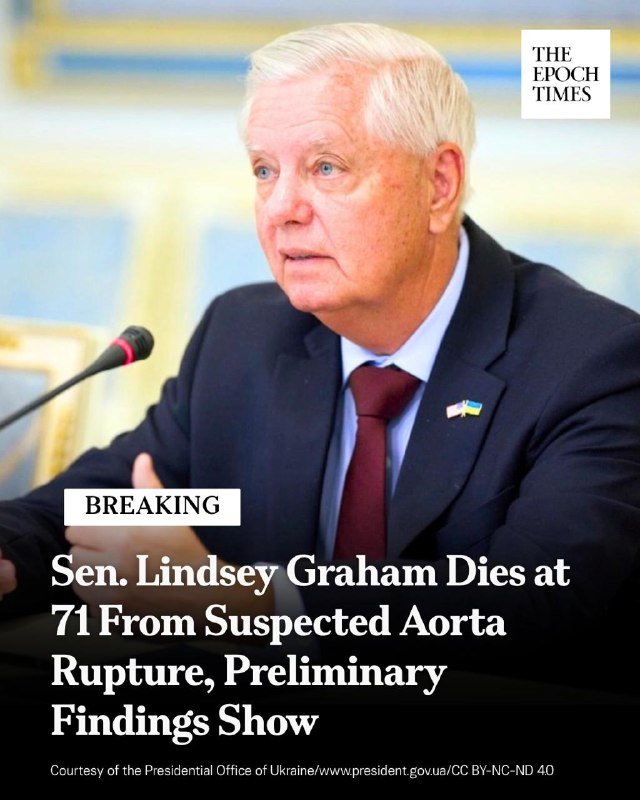 A white-haired man in a dark suit and burgundy tie speaks at a microphone, with "THE EPOCH TIMES" logo and a breaking news headline reading "Sen. Lindsey Graham Dies at 71 From Suspected Aorta Rupture, Preliminary Findings Show" overlaid.