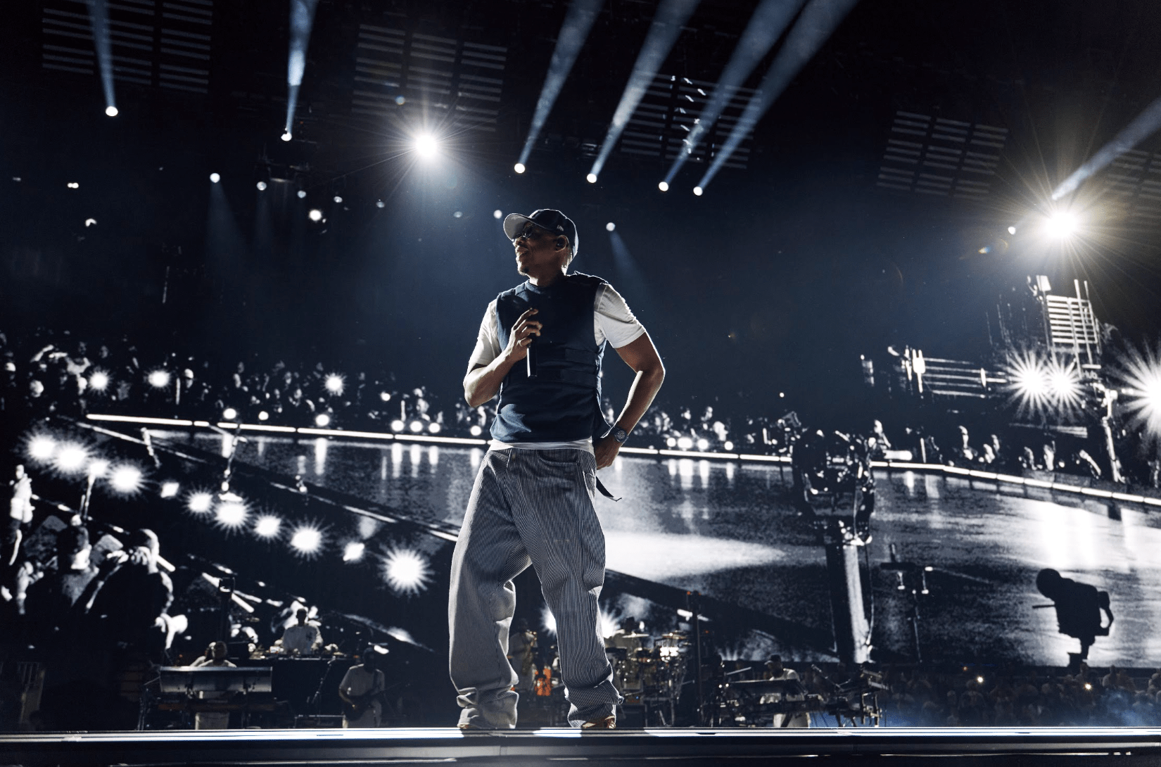 Jay-Z's third Yankee Stadium show was pushed back nearly four hours after fans reportedly breached the gates, exposing how thinly staffed security at marquee venues has become a structural liability.