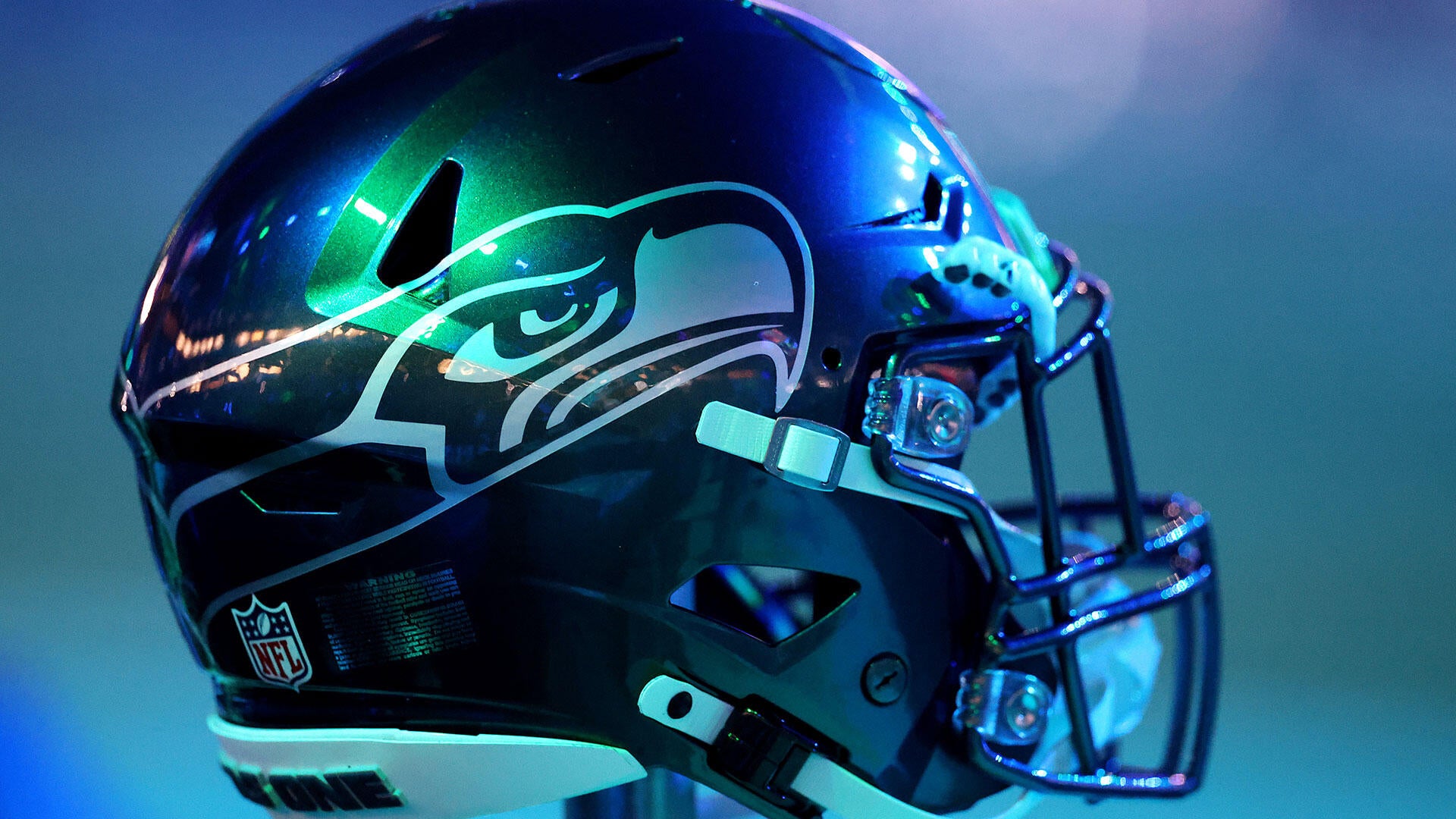 A Seattle Seahawks helmet on the sideline before a game at Lumen Field.