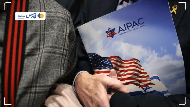 A person in a plaid jacket holds an AIPAC (America's Pro-Israel Lobby) brochure featuring American and Israeli flags.