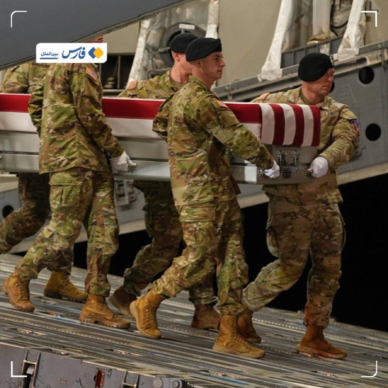 Soldiers in camouflage uniforms and white gloves carry a flag-draped casket off a military aircraft.