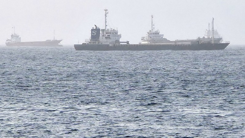 Tankers transit the Strait of Hormuz, the narrow waterway through which a significant share of seaborne crude passes.